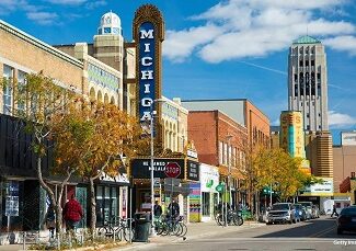 a city street with a sign that says michigan on it .