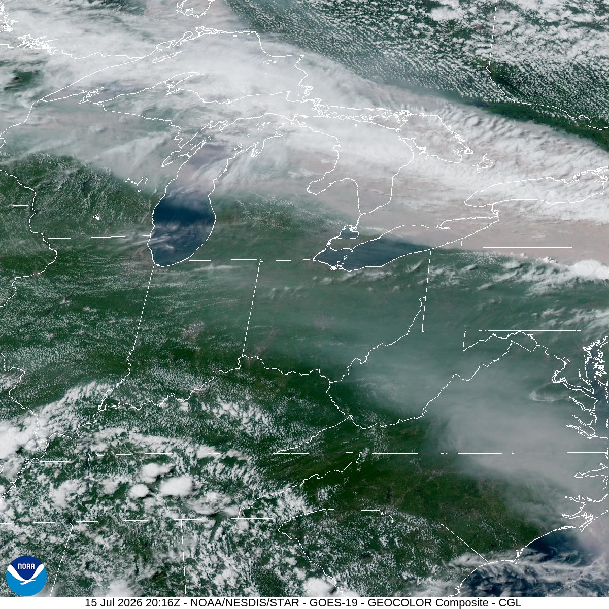NOAA GOES-19 GeoColor satellite image showing Canadian wildfire smoke streaming across the Great Lakes and Chicago region